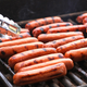 hot dogs on grill